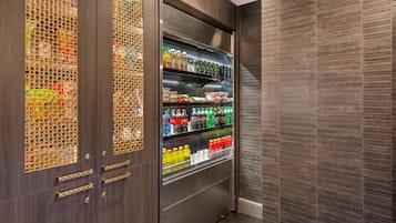 A vending machine with various beverages and snacks.