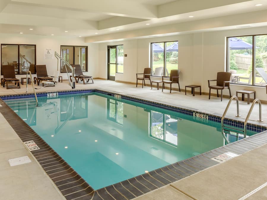 Indoor pool, open 6:00 AM to 10:00 PM, pool umbrellas, sun loungers