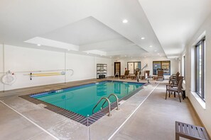 Indoor pool, open 6:00 AM to 10:00 PM, pool umbrellas, pool loungers