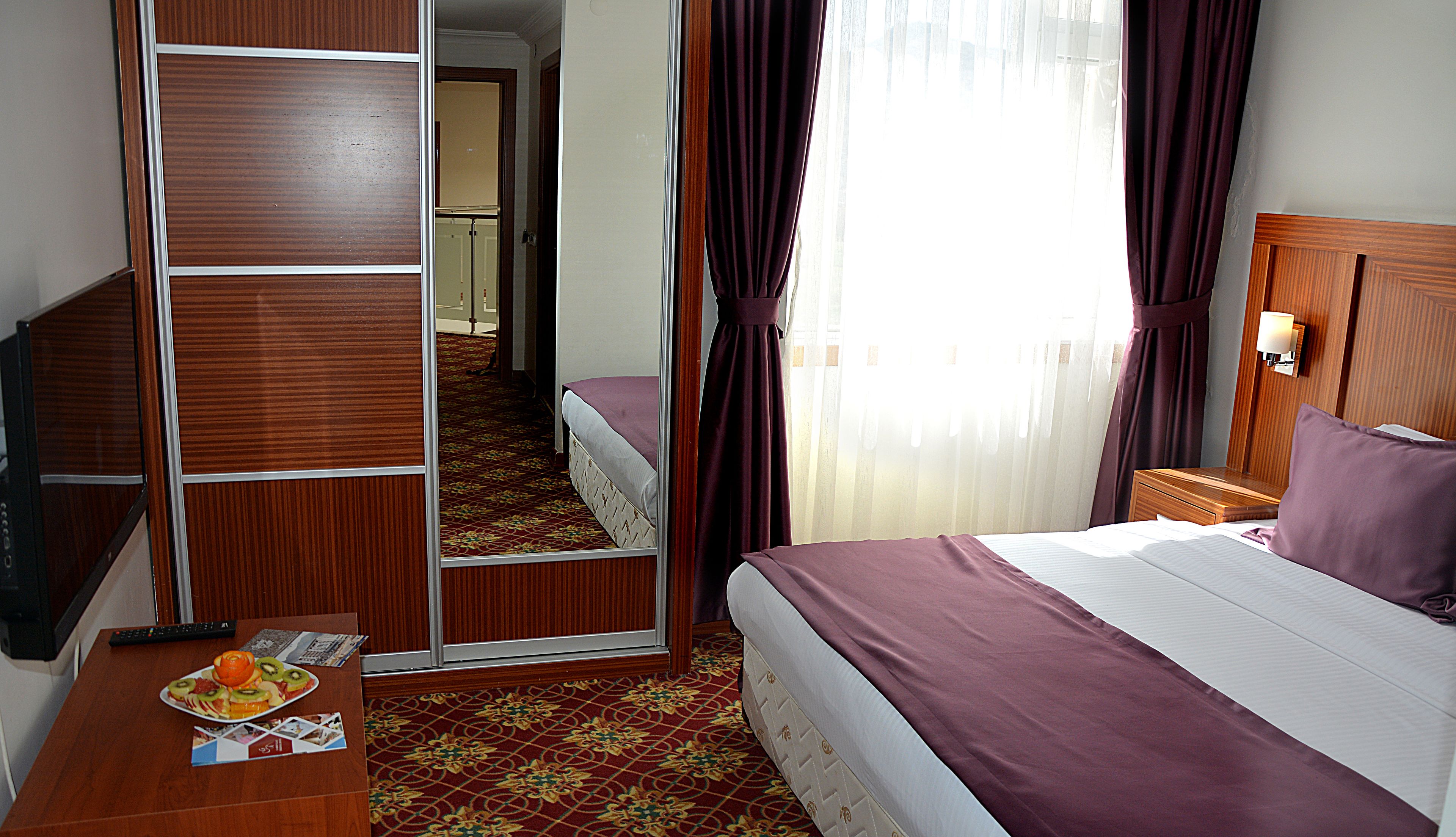 Family Room, 2 Bedrooms | Minibar, desk, blackout drapes, rollaway beds