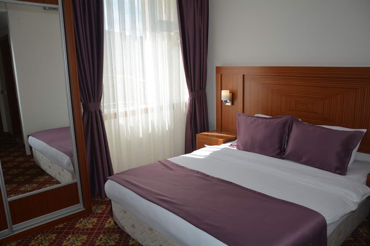 Family Room, 2 Bedrooms | Minibar, desk, blackout curtains, rollaway beds