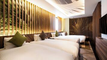 A hotel room with two beds, a large window, and a wooden panel wall.