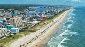 On the beach, sun-loungers