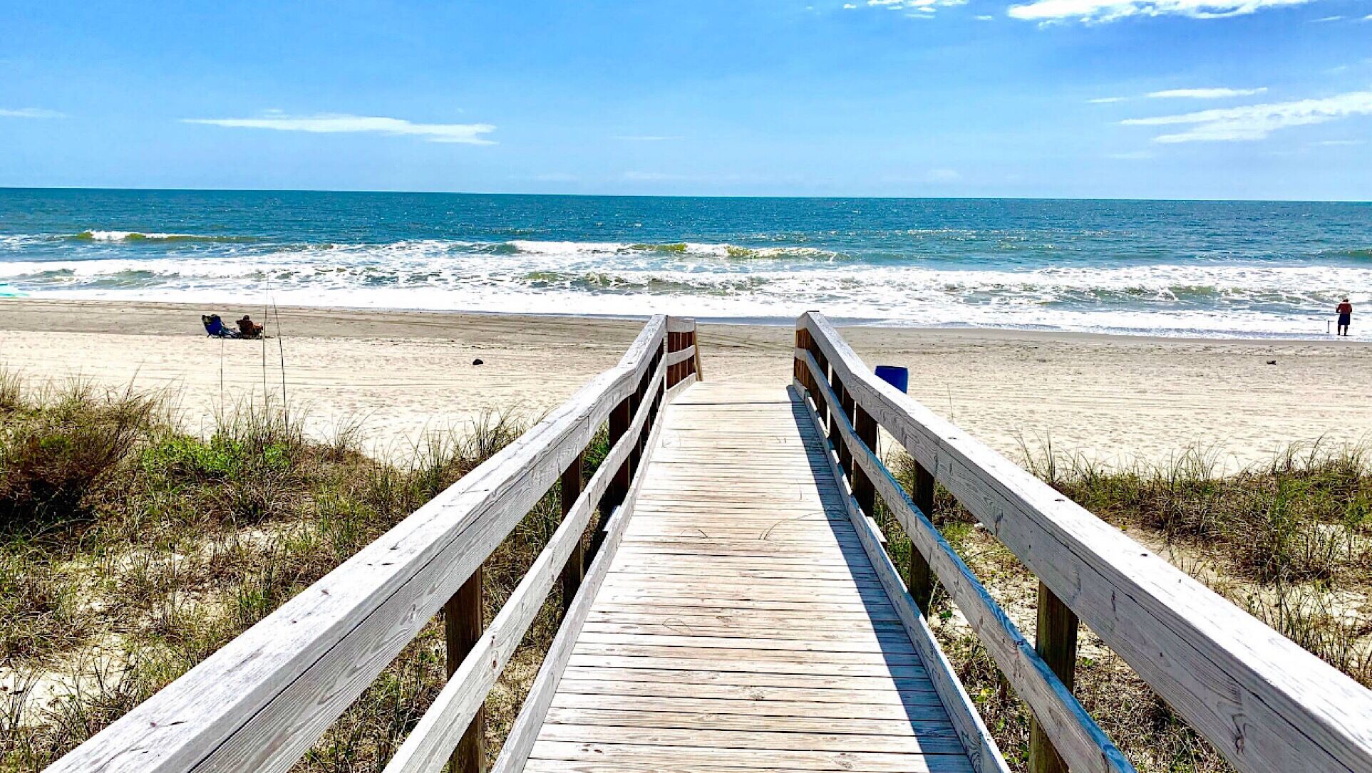 On the beach, sun-loungers