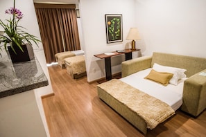 Minibar, desk, blackout curtains, iron/ironing board