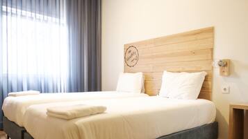 Habitación familiar | Cortinas opacas y sistema de insonorización