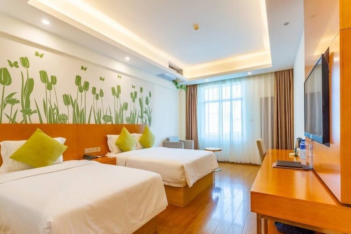 Habitación superior con 2 camas individuales | Wifi gratis