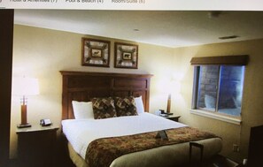 Relax in this inviting room with a large bed, two nightstands, and a window offering a view of the outside.