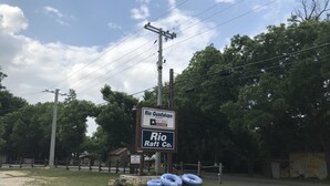A sign for Rio Guadaupe Resort, R.V. Park, and Cottages.