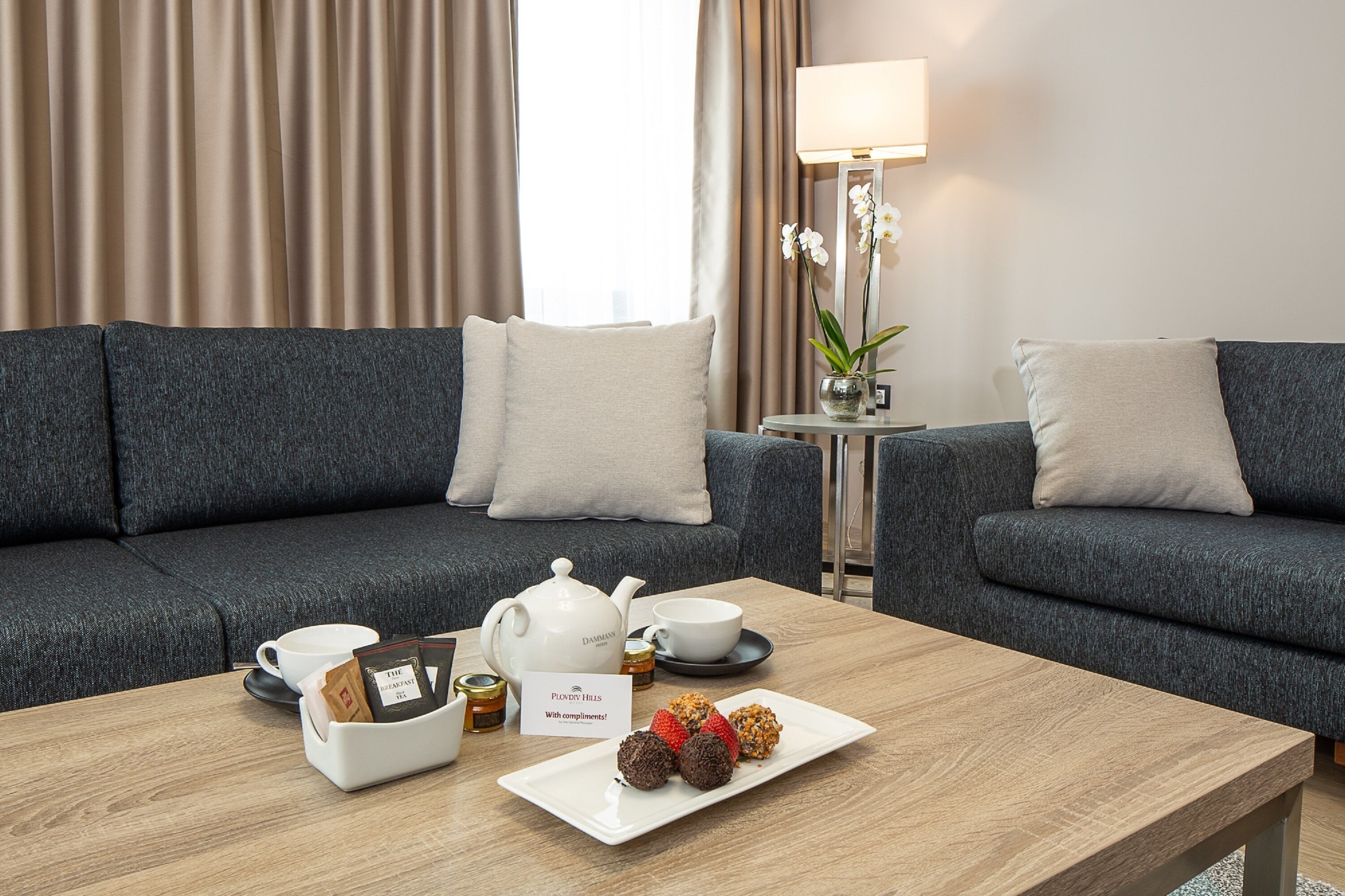 standard apartment, multiple beds, non smoking, kitchenette (with sofabed) | living area | 55-inch tv with cable channels