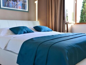 Appartement Deluxe, 2 chambres | Bureau, fer et planche à repasser, Wi-Fi gratuit, draps fournis
