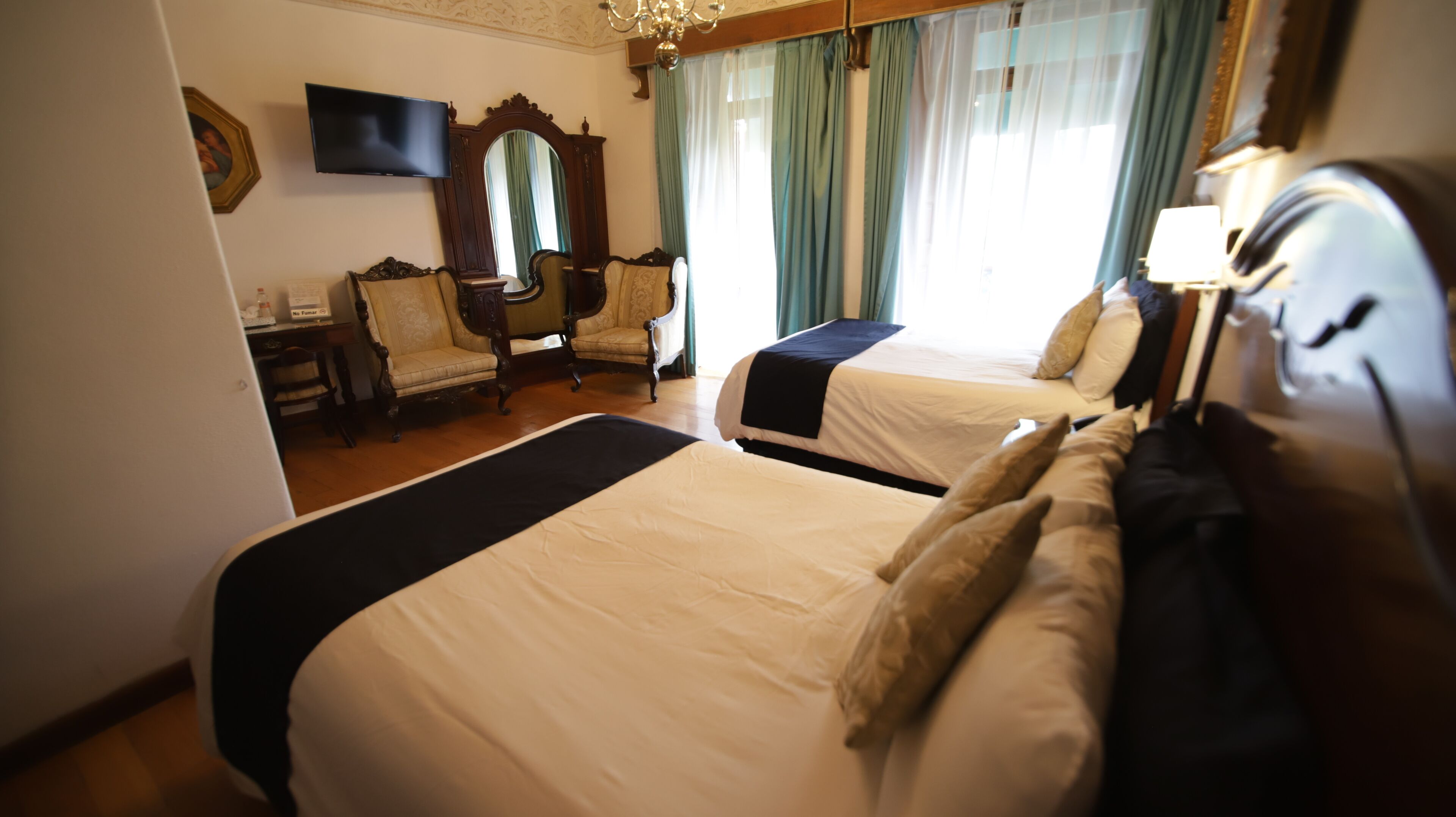 desk, blackout curtains, iron/ironing board, free wifi