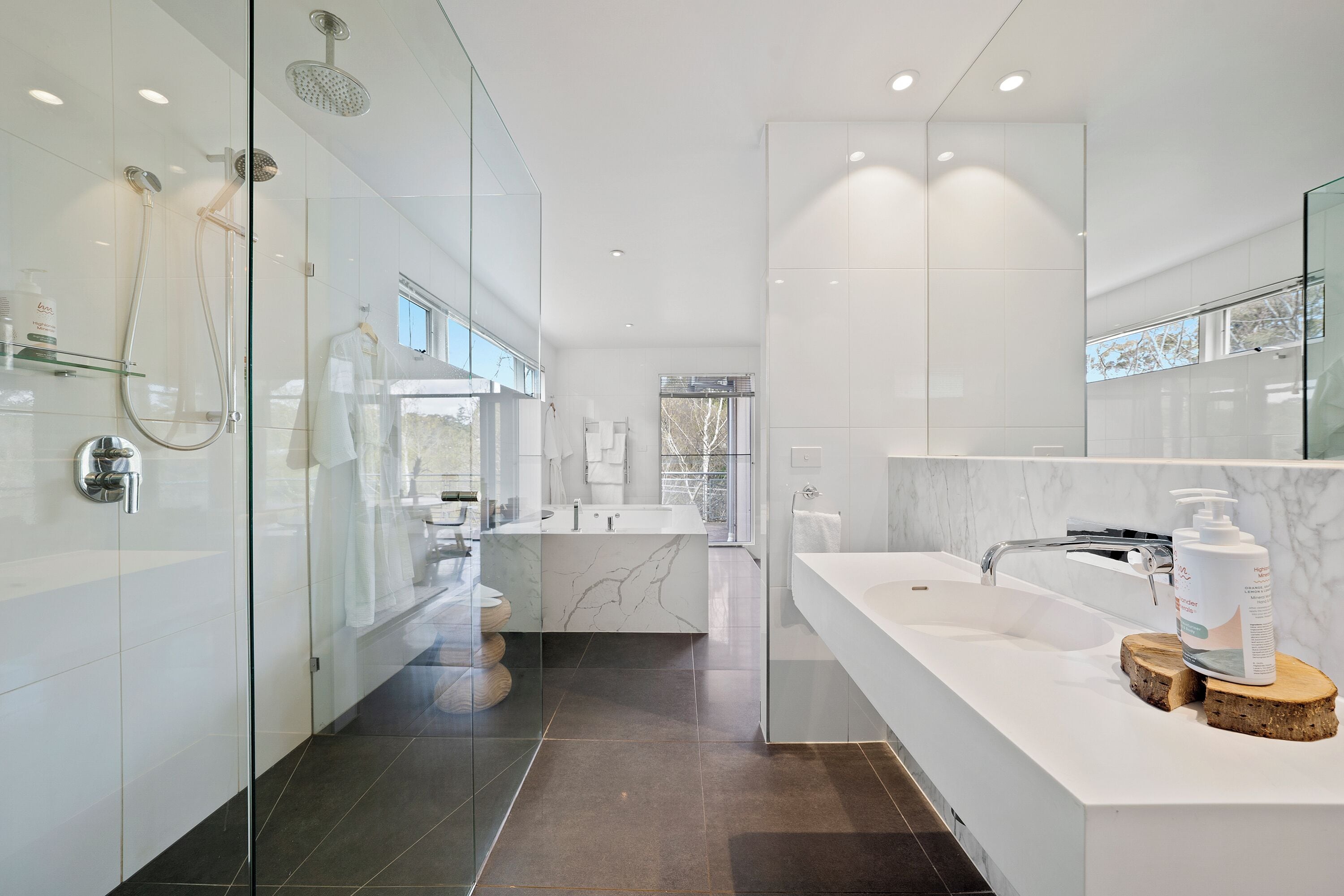 Separate tub and shower, jetted tub, rainfall showerhead