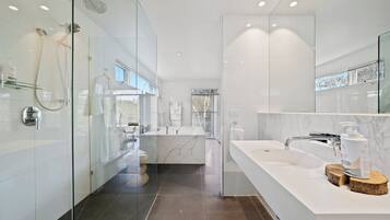 Separate tub and shower, jetted tub, rainfall showerhead