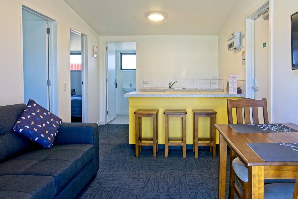 Two Bedroom Motel Unit | Private kitchenette | Fridge, microwave, high chair, cookware/dishes/utensils