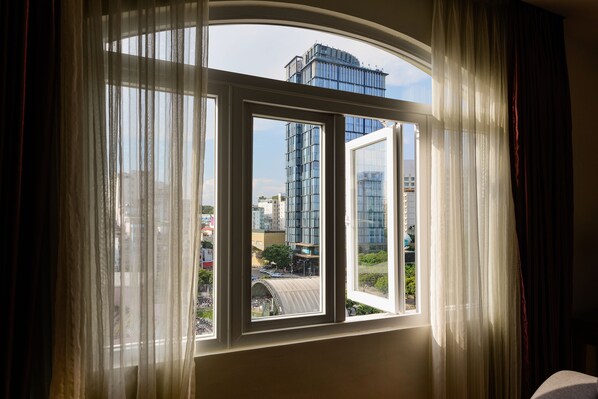 Suite, City View | Minibar, in-room safe, desk, blackout drapes - Saigonciti Hotel A (Ho Chi Minh City)