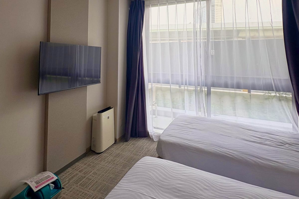 Chambre Standard avec lits jumeaux, non-fumeurs | Coffres-forts dans les chambres, fer et planche à repasser