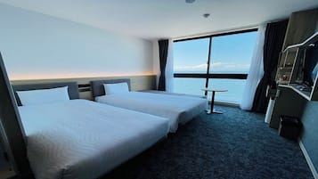 Deluxe Twin Room, Non Smoking | In-room safe, iron/ironing board, free WiFi, bed sheets