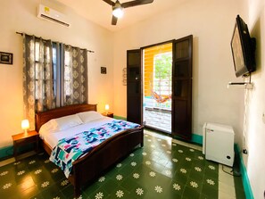 Deluxe Double or Twin Room, 1 Queen Bed, Private Bathroom, Garden Area | 1 bedroom, minibar, iron/ironing board, free WiFi