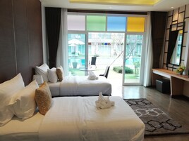 Premiere Twin Pool View | เครื่องนอนระดับพรีเมี��ยม, ห้องพักตกแต่งอย่างมีเอกลักษณ์, โต๊ะทำงาน