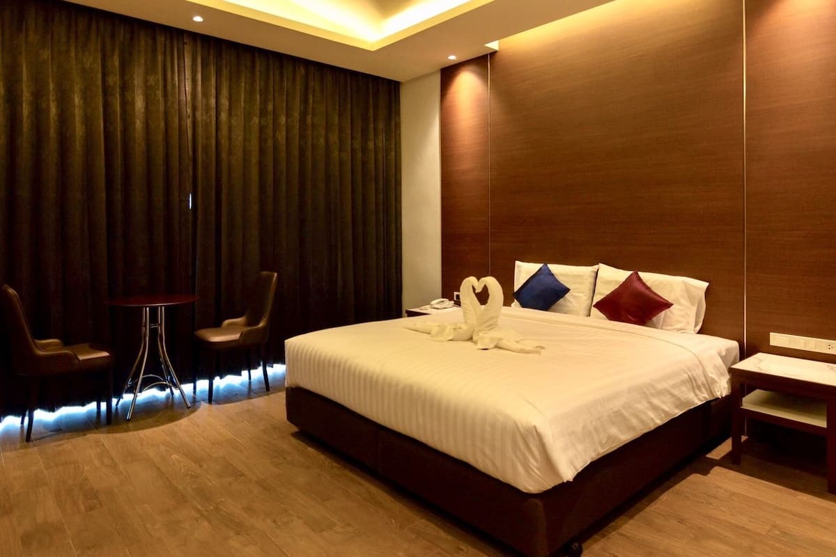 Luxe beddengoed, een bureau, verduisterende gordijnen, gratis wifi