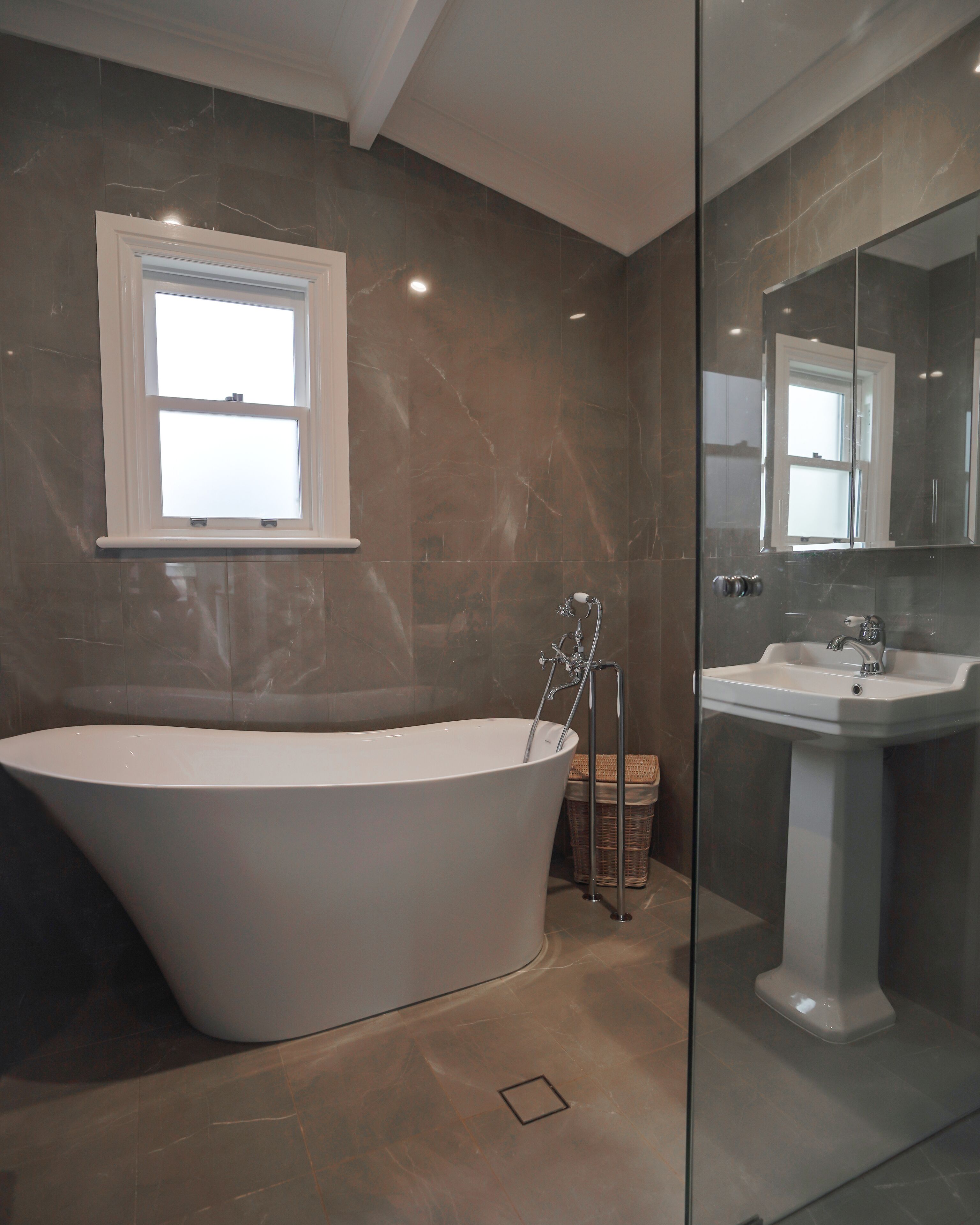 Bathtub, hair dryer, towels, soap