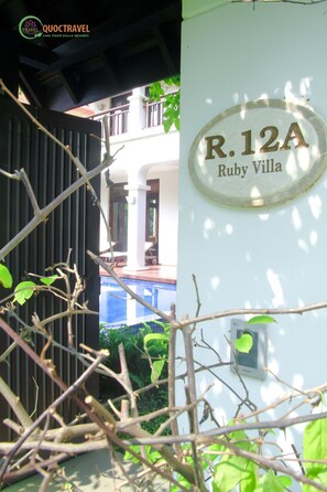Relax in the comfort of your villa, steps from the pool and lush surroundings.