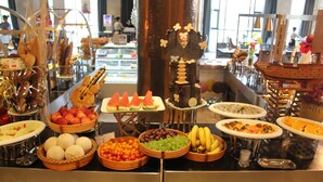 A buffet with various food items including fruits, vegetables, and desserts. - Worldhotel Grand Jiaxing Hunan (Changsha)