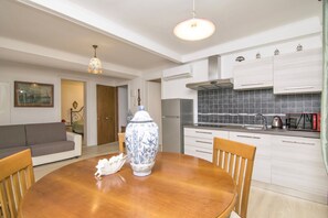 Apartamento, 1 quarto | Opções para refeição no quarto