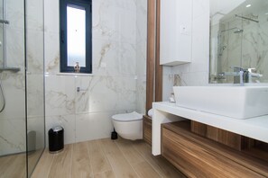 Shower, free toiletries, hair dryer, bathrobes