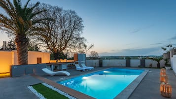 Seasonal outdoor pool, open 8:00 AM to 9:30 PM, sun loungers