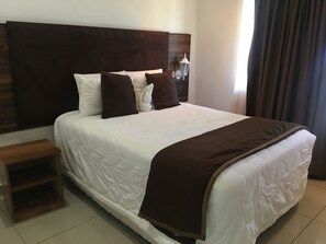 Executive Double Room | Minibar, desk, iron/ironing board, free WiFi