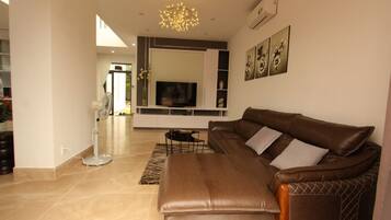 Signature Villa, 4 Bedrooms, Garden View | Living area | TV