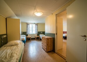 Triple Room, Shared Bathroom | Free cots/infant beds, rollaway beds, free WiFi