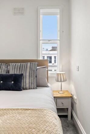 2 dormitorios, tabla de planchar con plancha, wifi