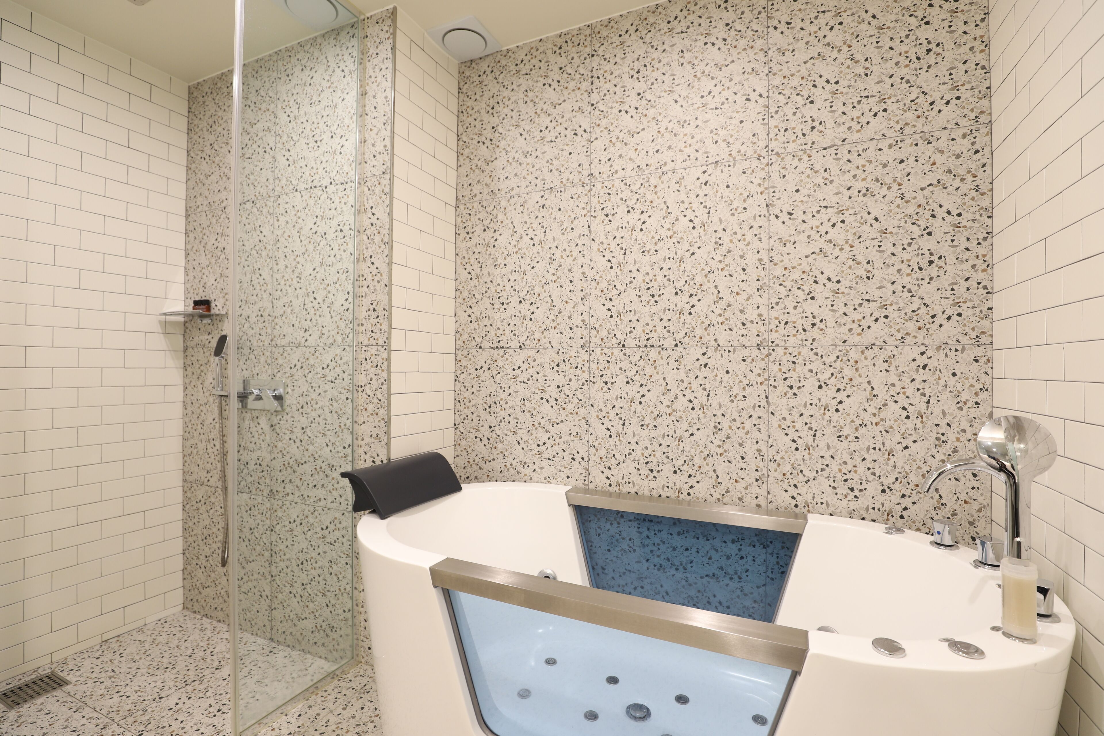 family suite room | bathroom | free toiletries, hair dryer, bathrobes, slippers