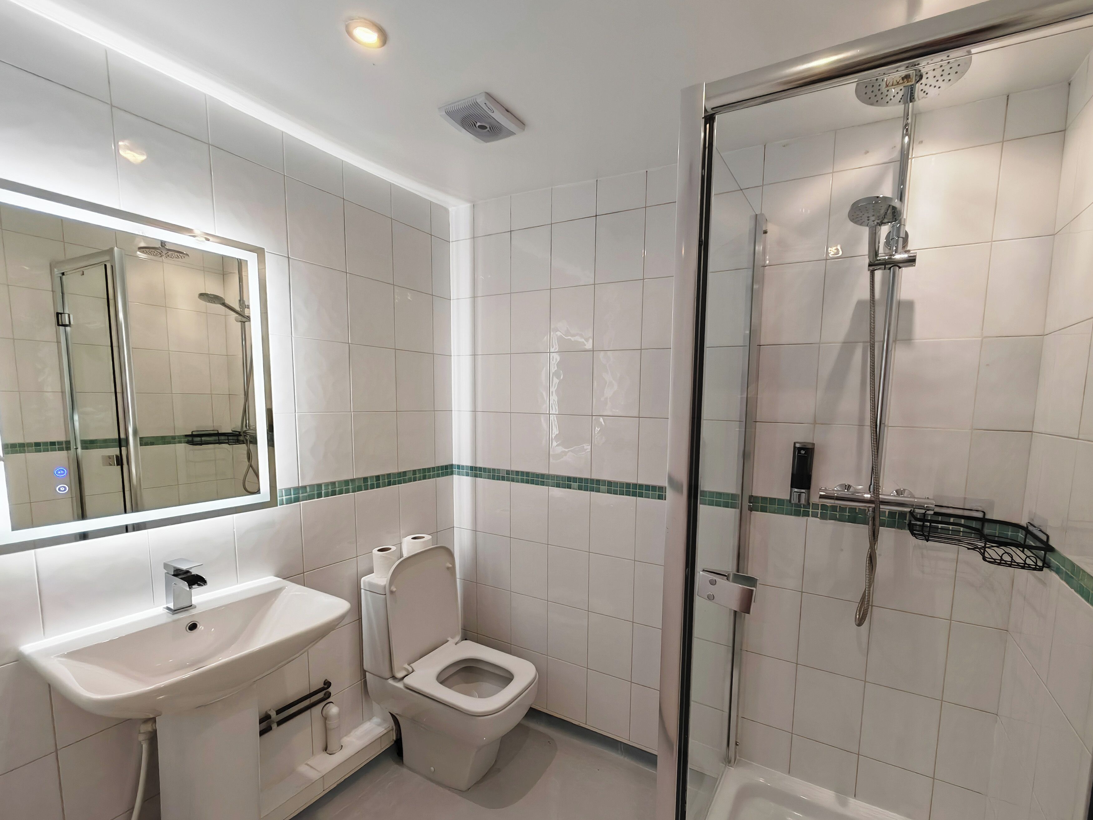 standard studio | bathroom | shower, hair dryer, towels