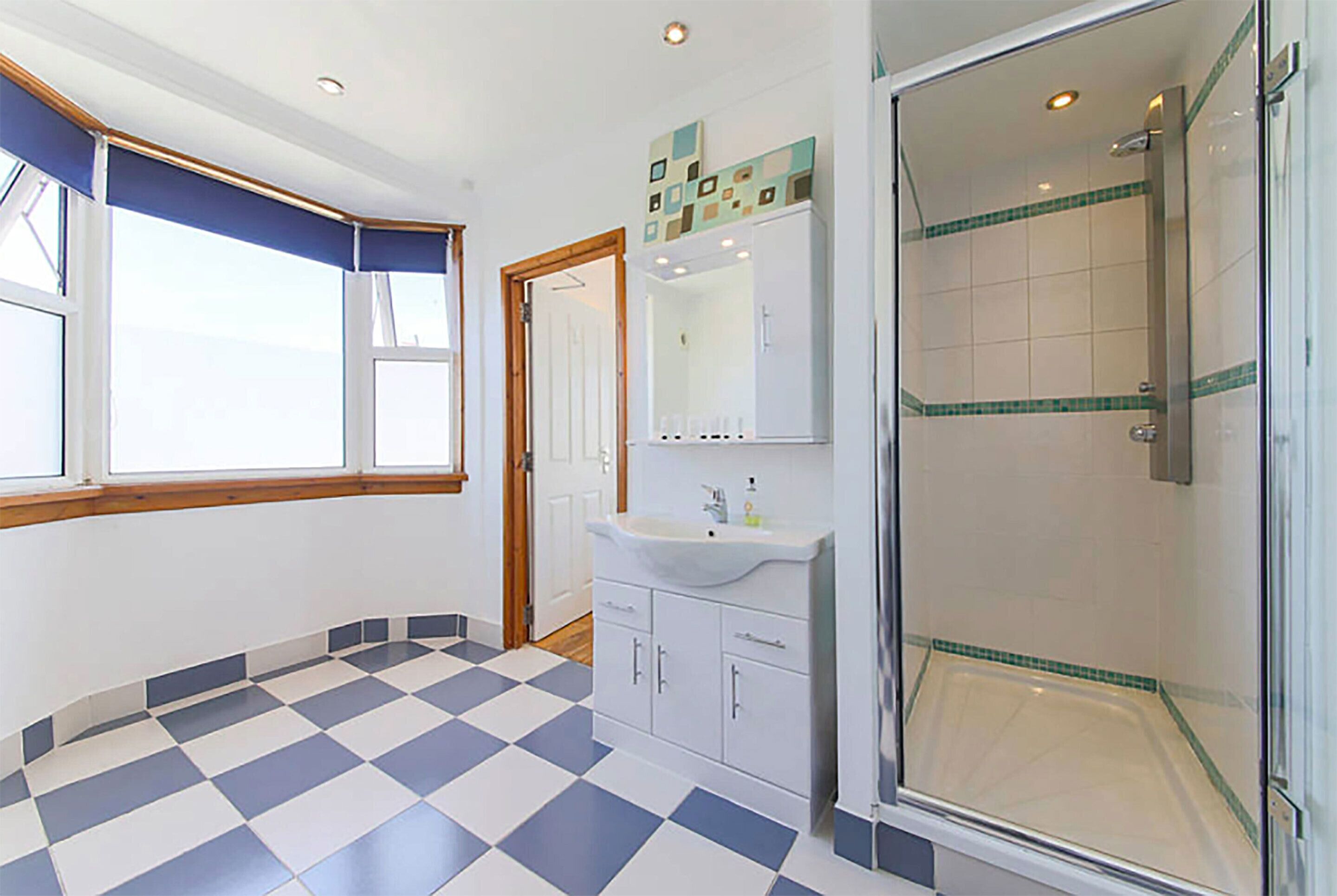 penthouse apartment | bathroom | shower, hair dryer, towels