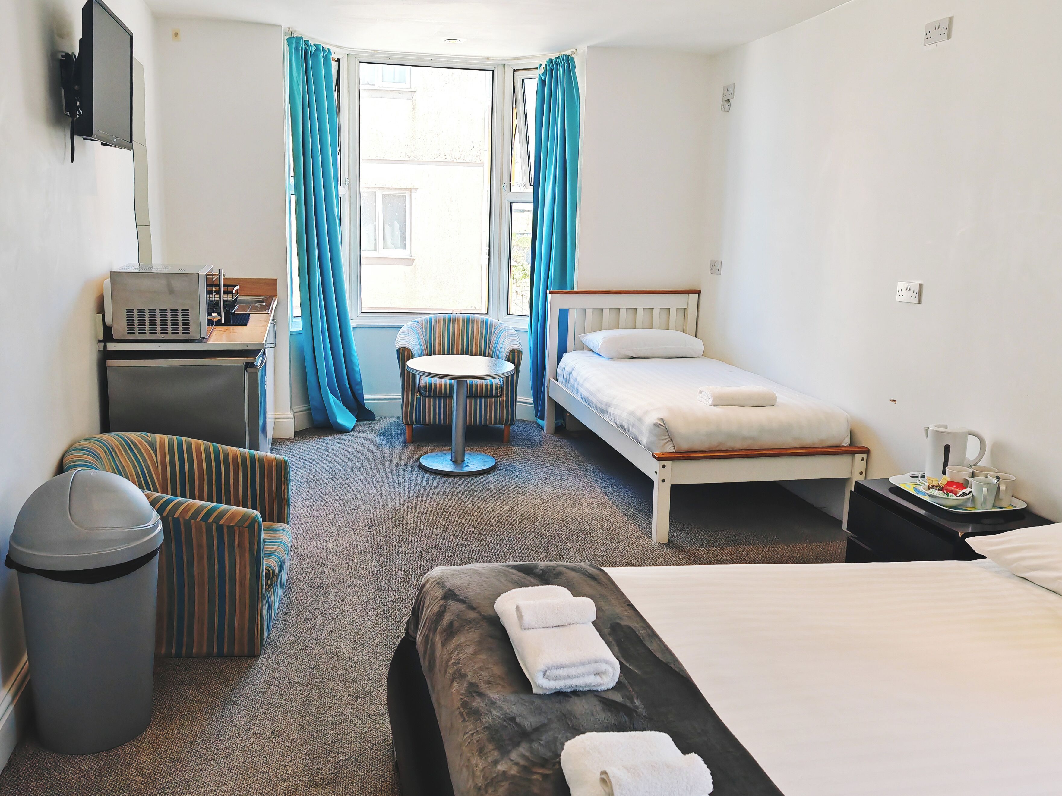 superior family room | living area | flat-screen tv