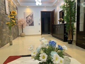 Elite Apartment | Living area | 32-inch Smart TV with satellite channels - Casa De Horyea  (Cairo)