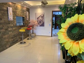 Elite Apartment | Living area | 32-inch Smart TV with satellite channels - Casa De Horyea  (Cairo)