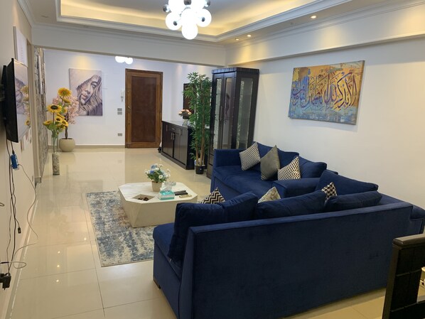 Elite Apartment | Living area | 32-inch Smart TV with satellite channels - Casa De Horyea  (Cairo)