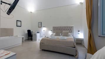 Traditional Suite, Jetted Tub | In-room safe, desk, free WiFi, bed sheets