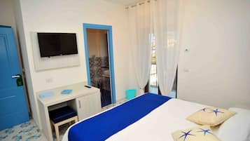 Chambre Confort Double ou avec lits jumeaux, 1 grand lit, vue jardin