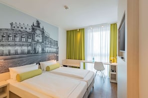 Hypo-allergenic bedding, in-room safe, desk, laptop workspace