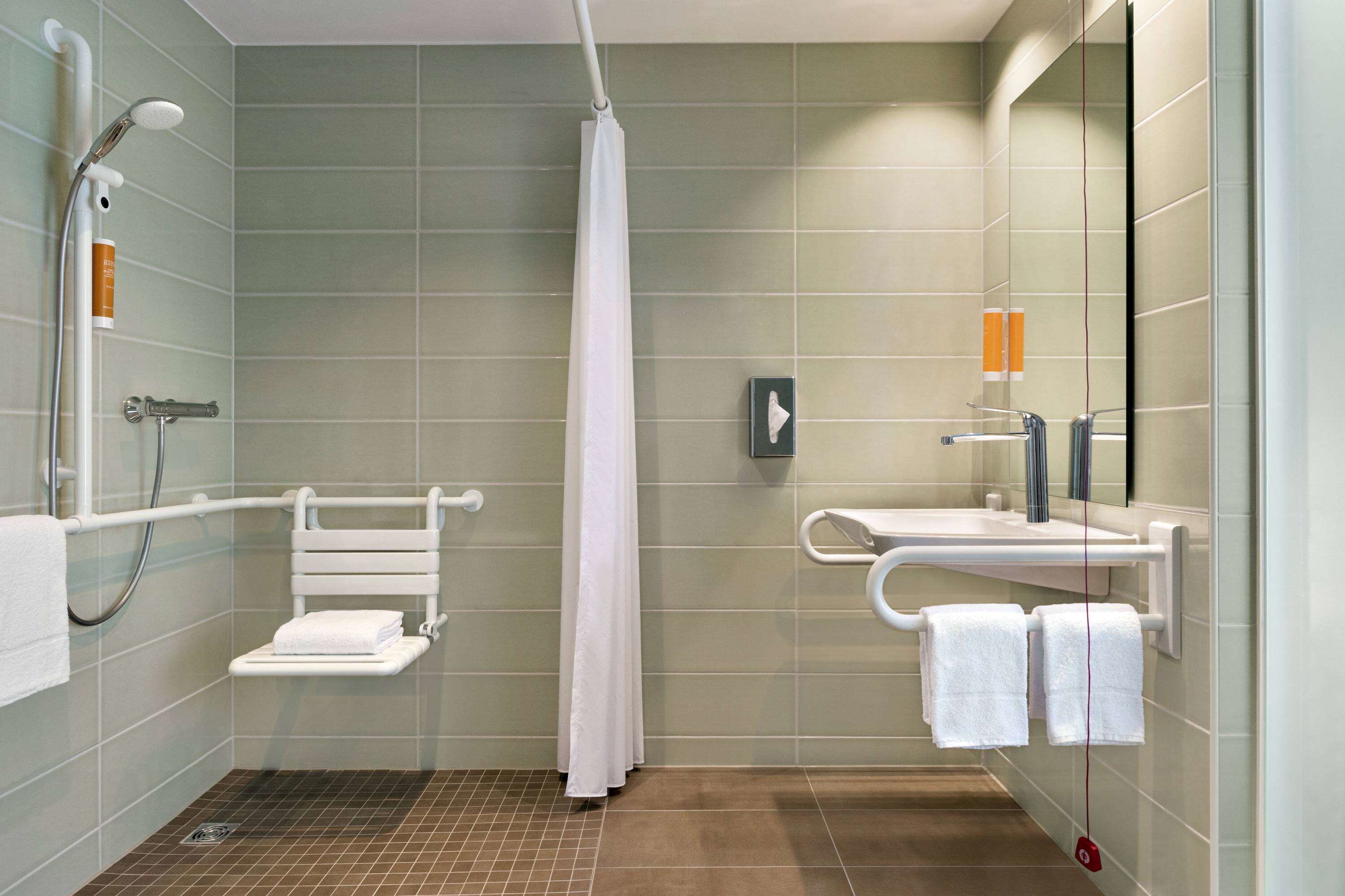 room, 1 double bed, accessible, non smoking | bathroom | shower, hair dryer, towels, soap