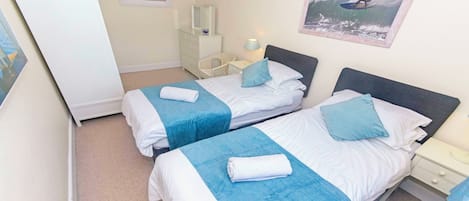 4 bedrooms, desk, iron/ironing board, travel crib