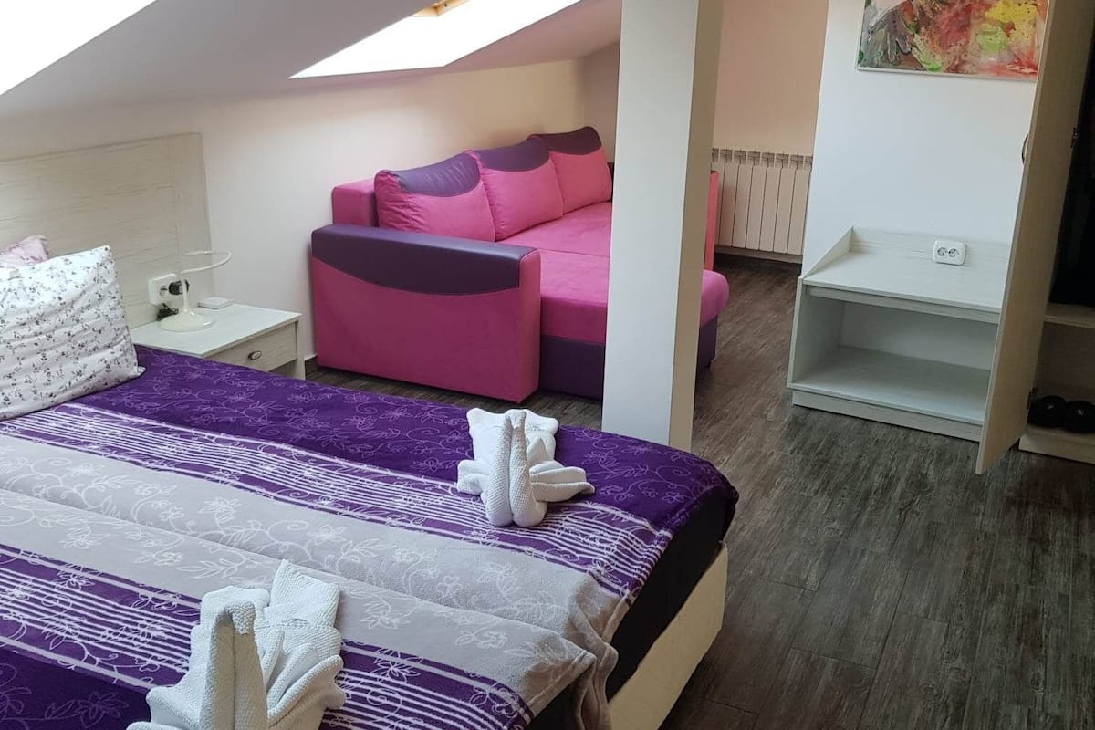 Familie vierpersoonskamer | 1 slaapkamer, luxe beddengoed, donzen dekbedden, een kluis op de kamer