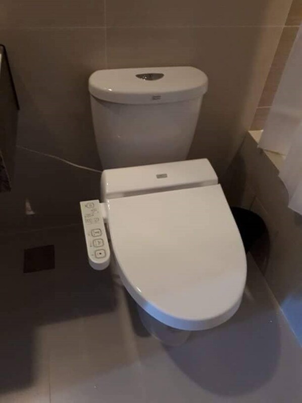 A modern toilet with a control panel. - EJB room at the Mactan Newton (Lapu-Lapu)