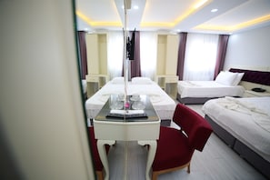 Family Room | Minibar, desk, soundproofing, iron/ironing board - Taksim Diamond Hotel (Istanbul)